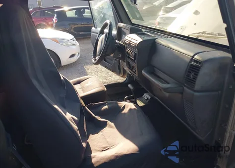 2002 Jeep Wrangler Sport z USA, uszkodzony, nr VIN 1J4FA49S62P704565